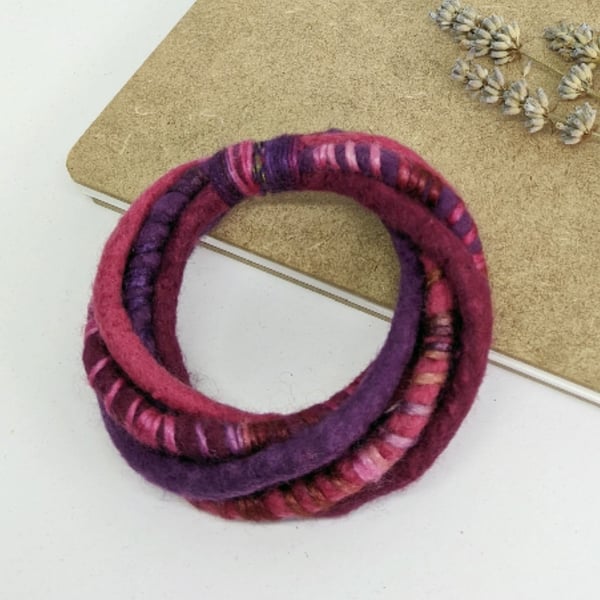 Felted cord bracelet in cerise, burgundy and berry shades