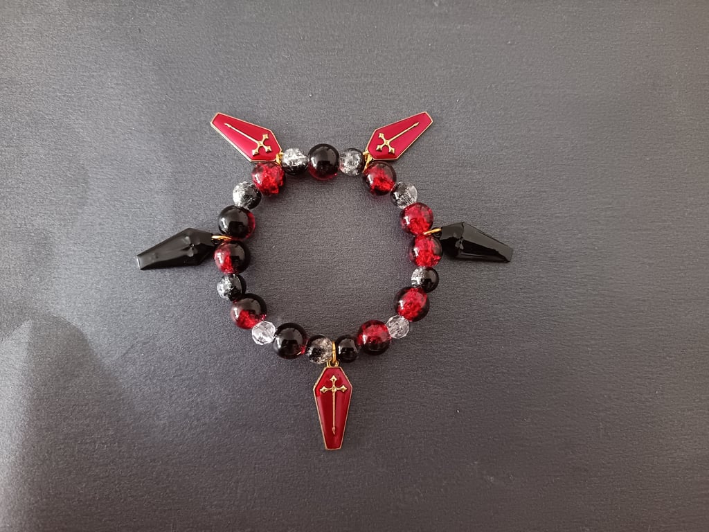 Elasticated beaded red and black gothic bracelet with coffin charms 