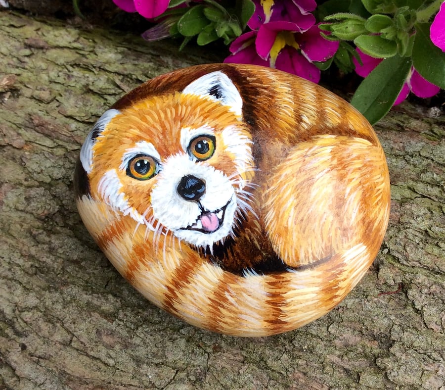 Red panda painted pebble 