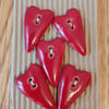 Long red ceramic heart buttons