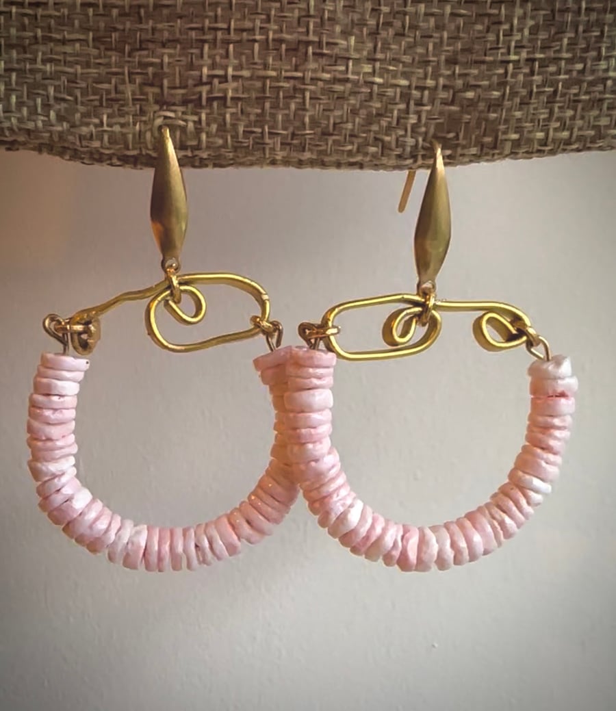 Handmade gold earrings with pink shell beads