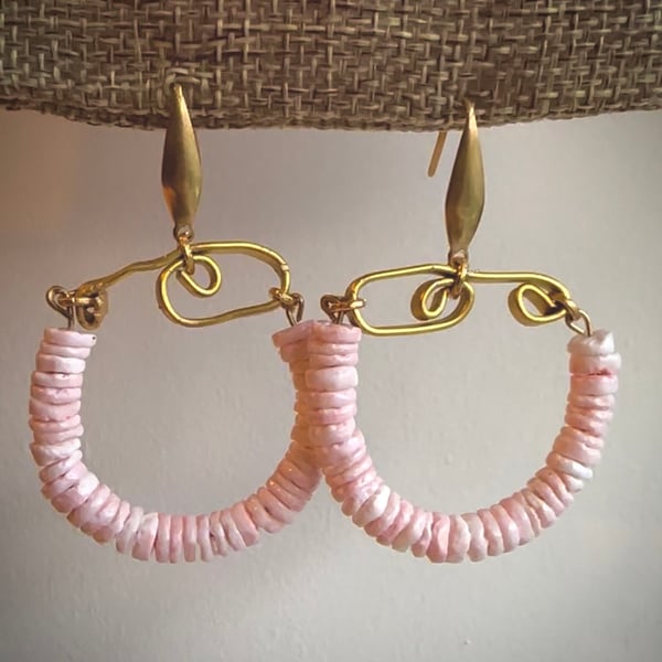 Handmade gold earrings with pink shell beads