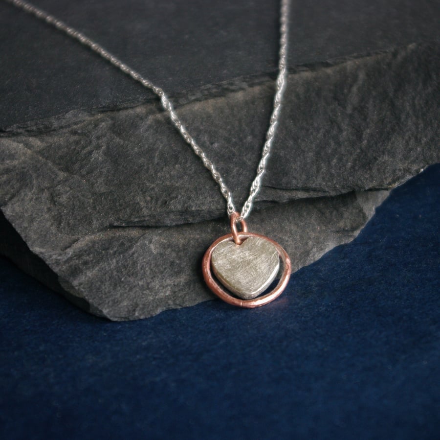 Silver and Copper Circle of Love Heart Necklace