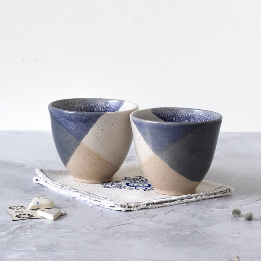 Handmade ceramic wine tumbler beaker cup glazed in blue and white