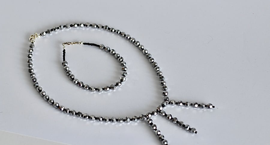 Silver and black spacer beads necklace and bracelet 
