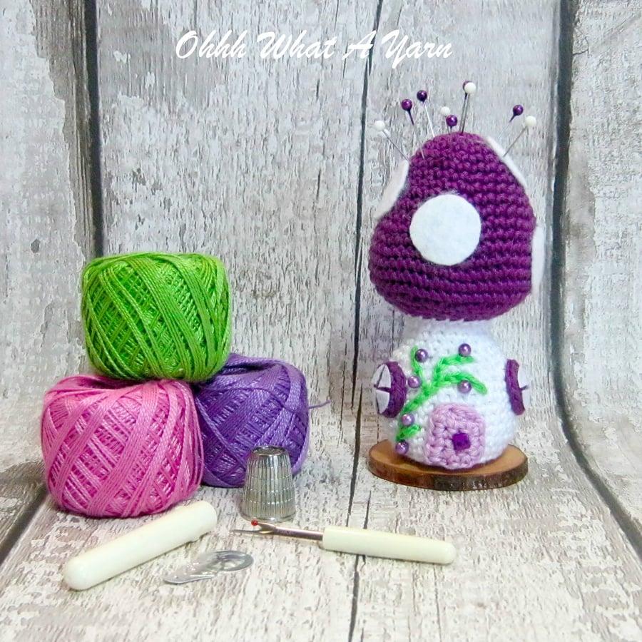 Crochet purple toadstool fairy house pin cushion, ornament. 