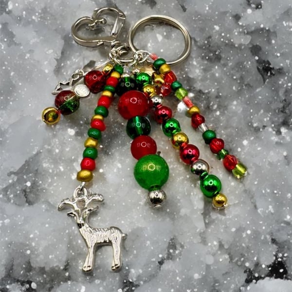 Christmas keyring in traditional festive colours, it can also be used as a bag .