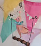 Handmade party birdy on a perch soft sculpture textile art