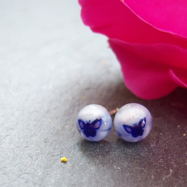 Butterfly glass stud earrings in purple and white