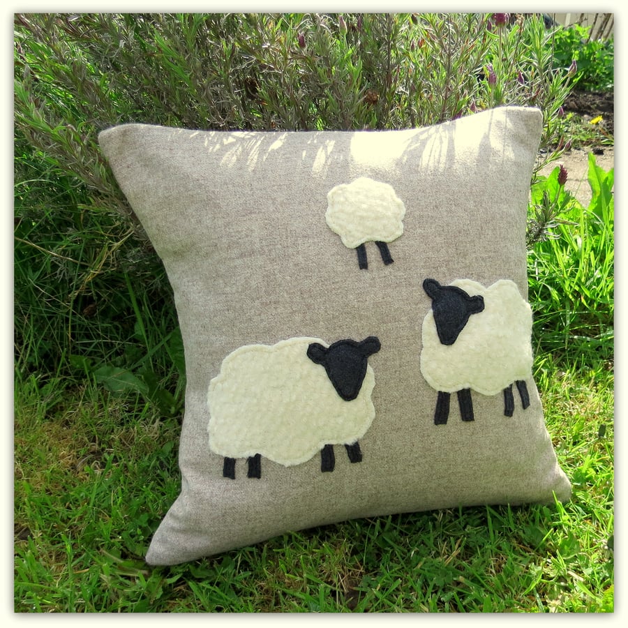 Sheep.  A 38cm x 38cm woollen cushion.  Complete with feather pad. Spring.