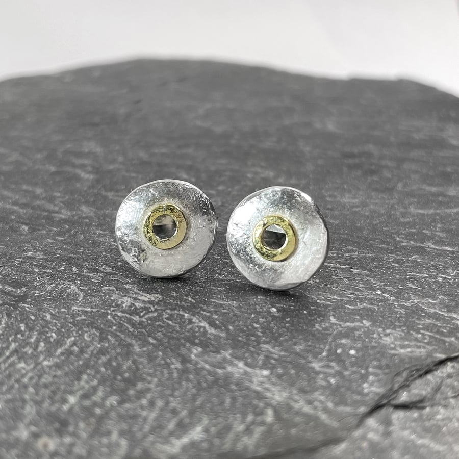 Silver and 18ct gold stud earrings , circular studs