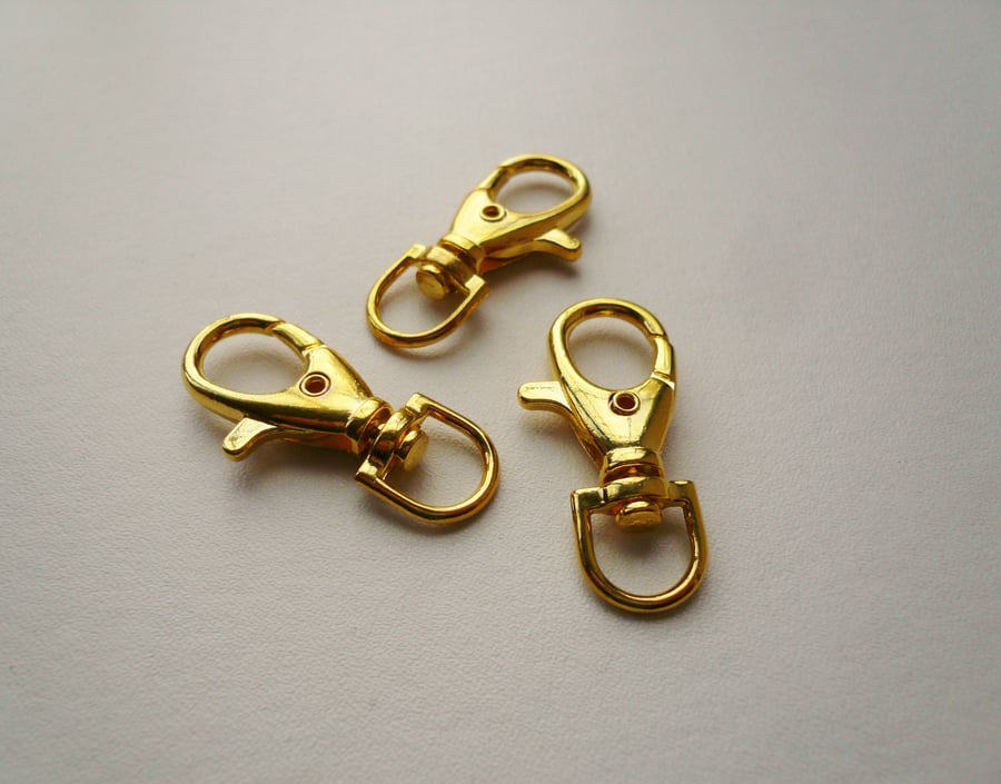 3 Gold Toned Trigger Clasps