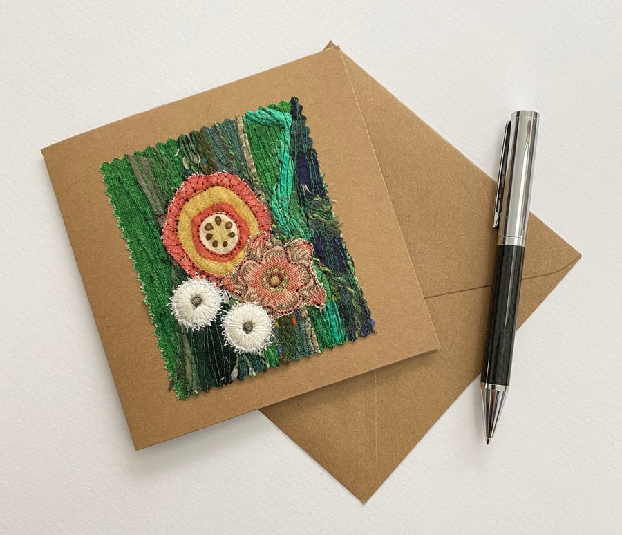 Up-cycled embroidered flower garden card. 