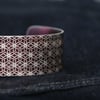 Geometric flower print cuff bracelet plum