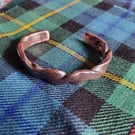Beefy copper bracelet twisted in fire and forged on the anvil