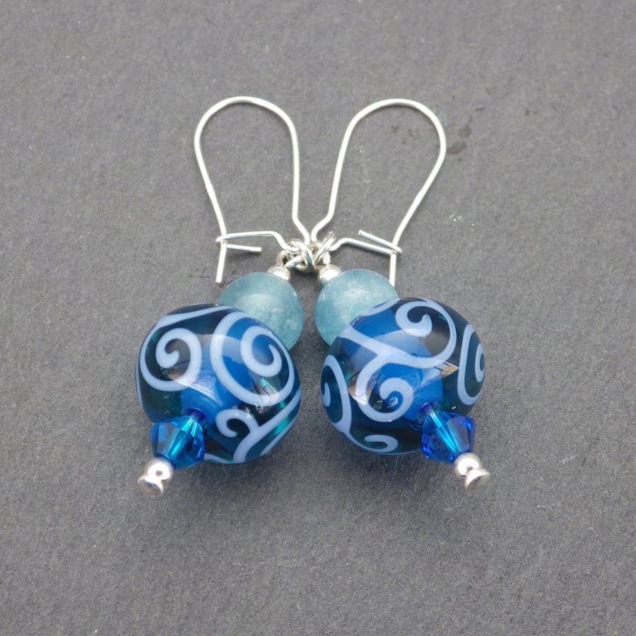 Blue swirling UK lampwork glass bead earrings with blue sponge quartz