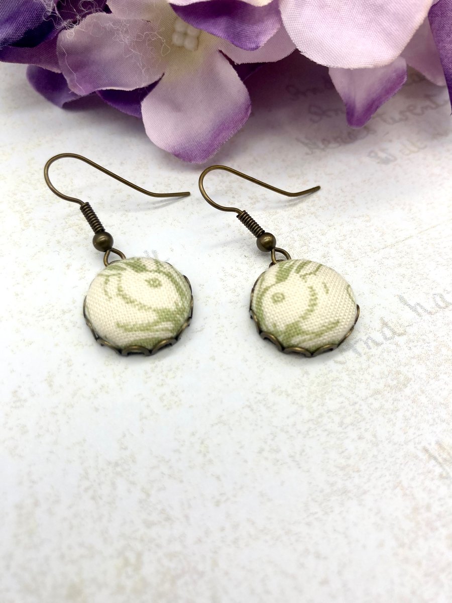 Pair of Rabbits fabric button earrings pale green William Morris antique bronze