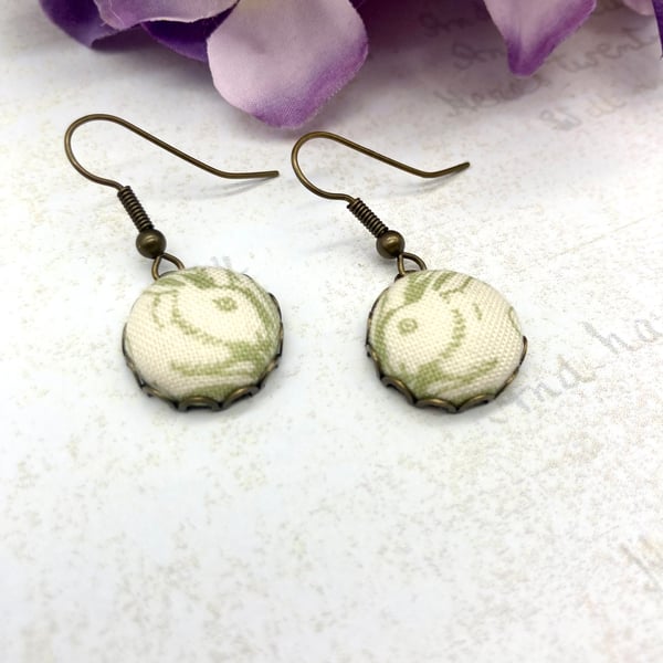Pair of Rabbits fabric button earrings pale green William Morris antique bronze