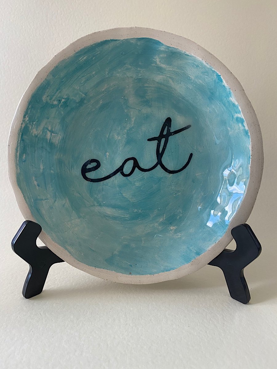 Turquoise Eat ceramic handmade plate. 