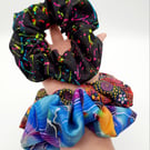 Large scrunchies,  set of 3. Black neon, blue petal fabric.  
