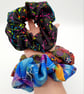 Large scrunchies,  set of 3. Black neon, blue petal fabric.  