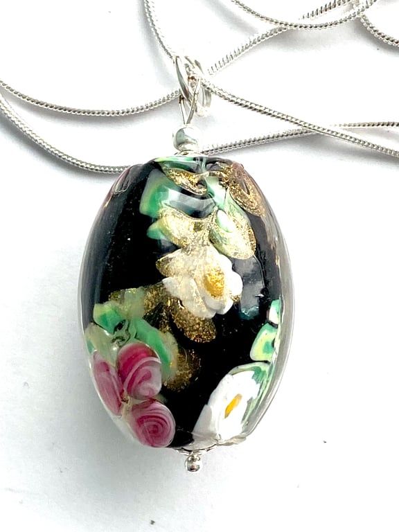 Murano Glass black floral cased glass pendant with sterling silver chain.