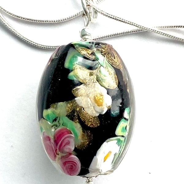 Murano Glass black floral cased glass pendant with sterling silver chain.