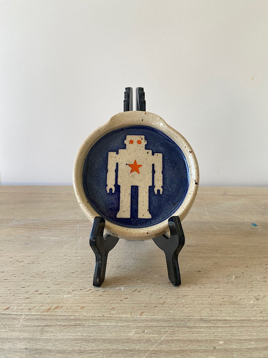 Robot ceramic spoon rest.
