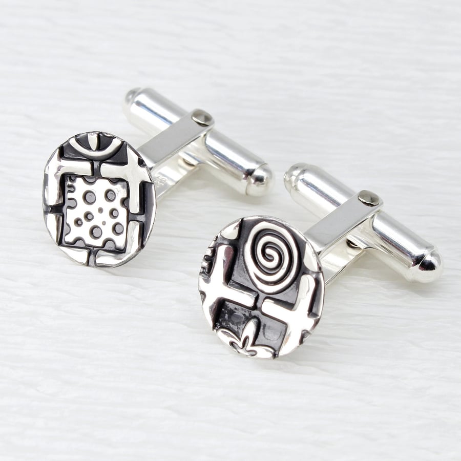 Handmade oxidised sterling silver cufflinks, slightly concave shape, 13mm dia.