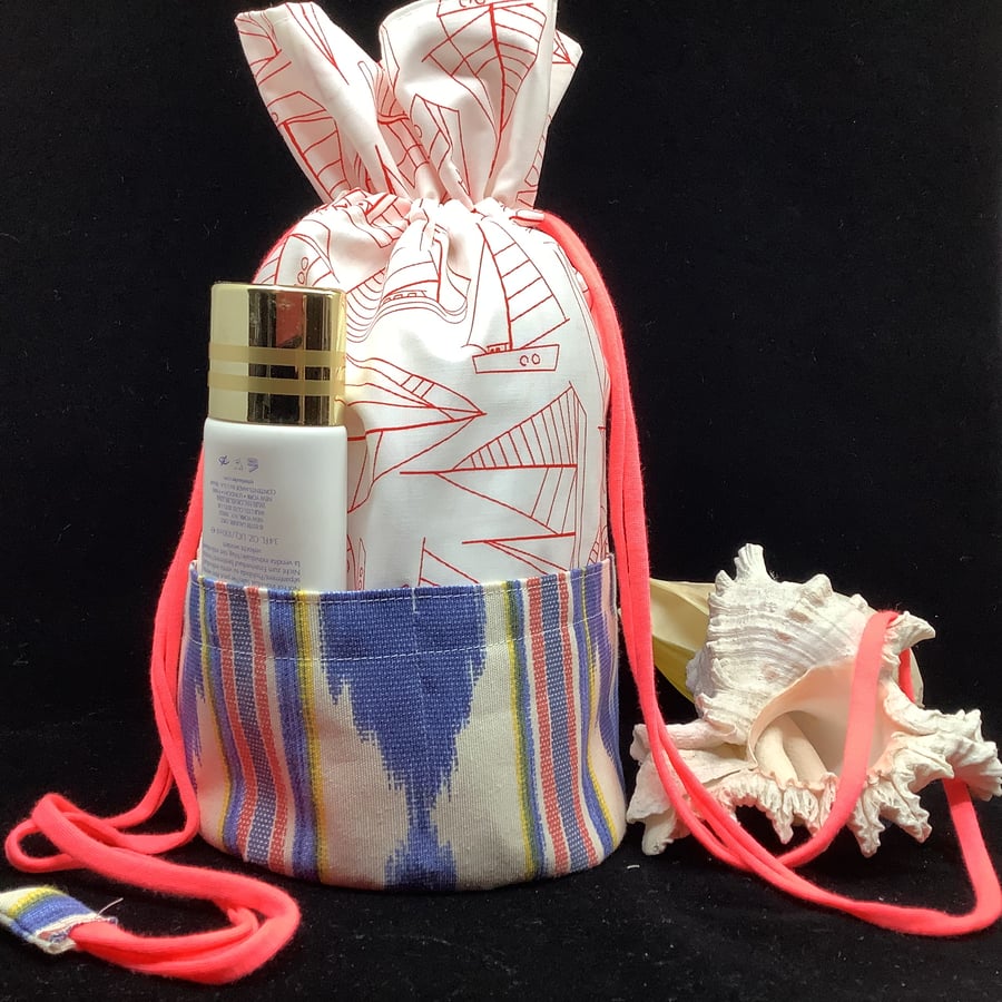 Duffle bag for toiletries and  craft work beach theme print. Draw string top.