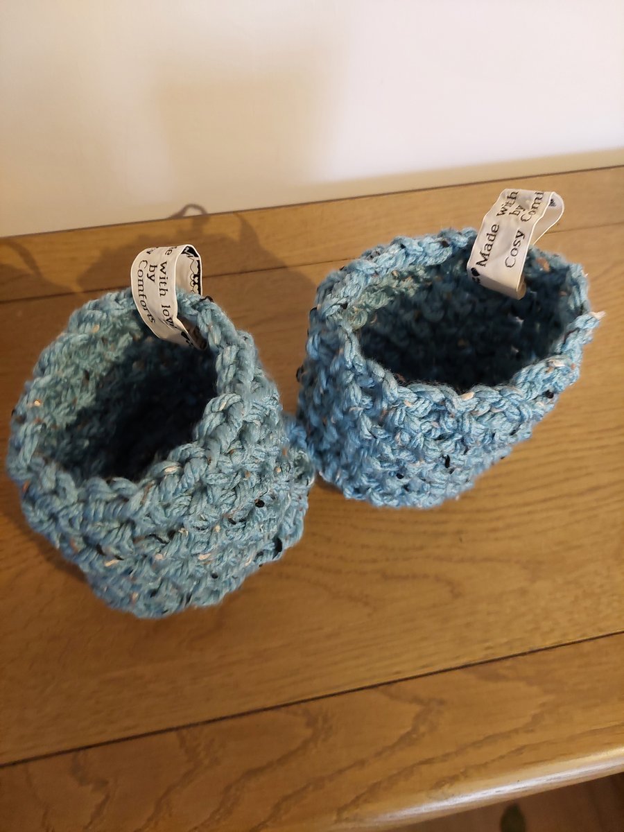 Pair teal crochet baskets approx 4x5"