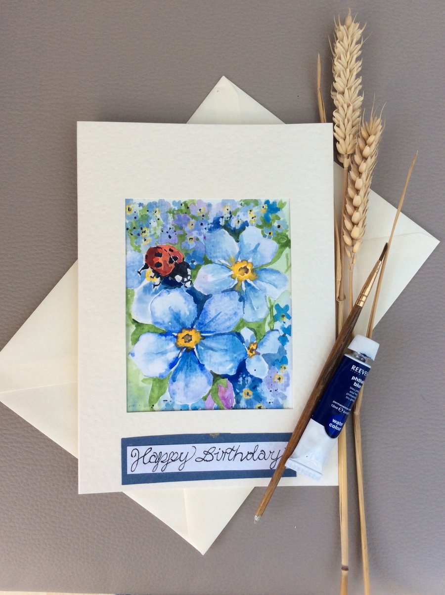 Unique card made using Original watercolour painting of ladybug on forget-me-not