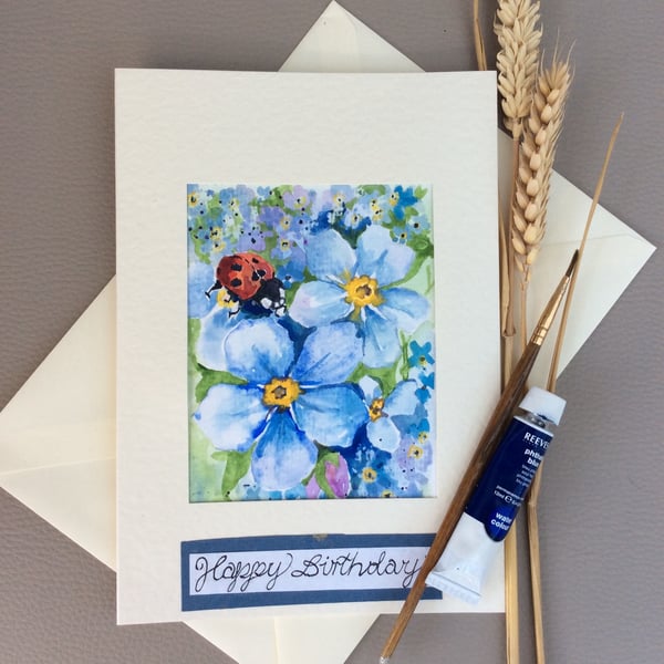 Unique card made using Original watercolour painting of ladybug on forget-me-not