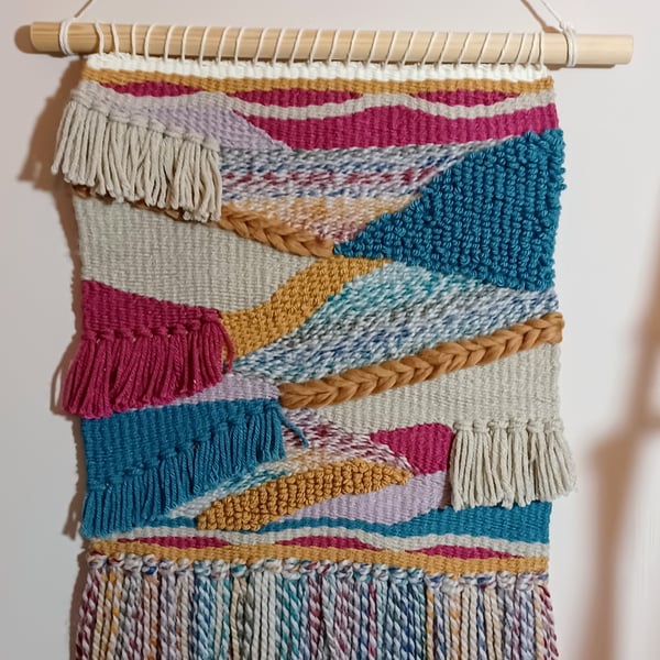 Handwoven wall hanging, sand and sea