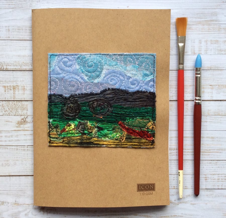 Embroidered sketchbook, journal or scrapbook. 