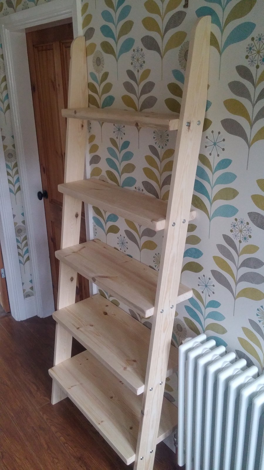 Lean to bookcase ladder shelf