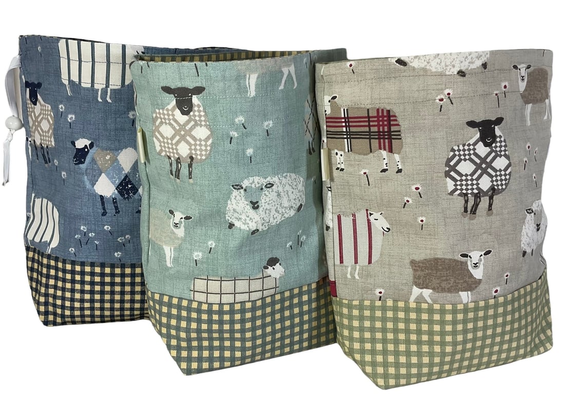 Two at a time knitting bag with tartanplaid sheep, blue sock sack, drawstring di