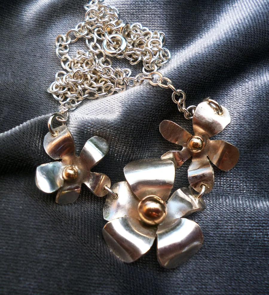 Triptich sterling silver and 9ct gold flower necklace