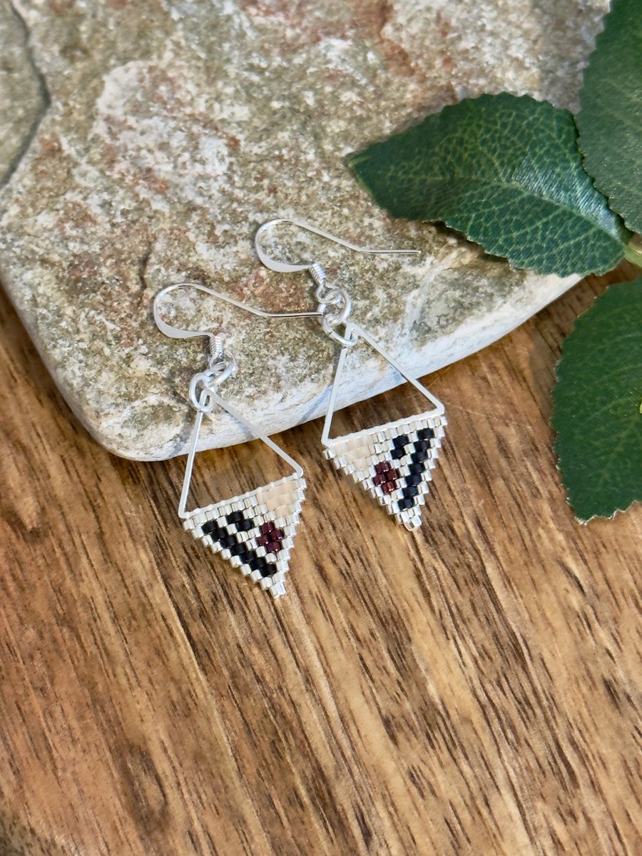 Lightweight geometric beadwork earrings in silver, black and deep raspberry 