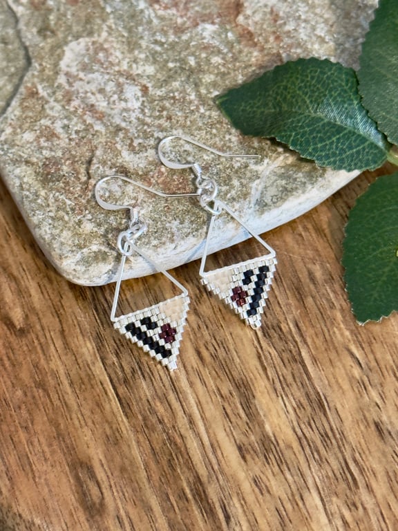 Lightweight geometric beadwork earrings in silver, black and deep raspberry 