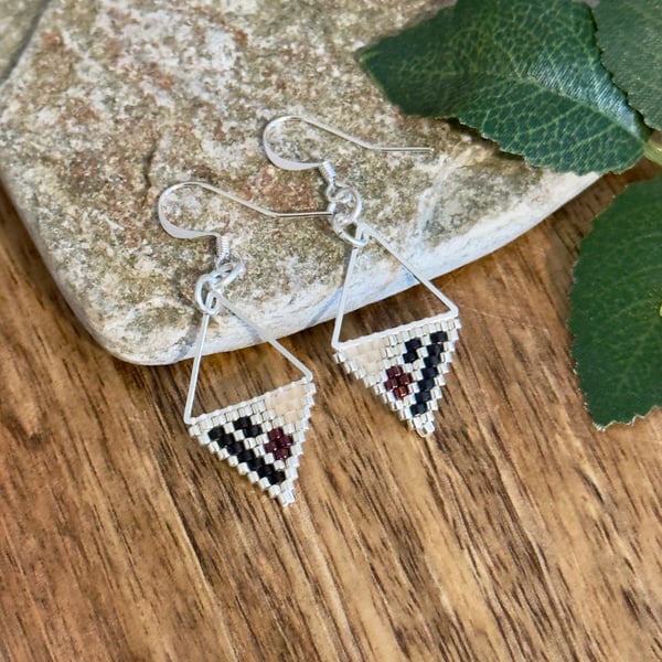Lightweight geometric beadwork earrings in silver, black and deep raspberry 