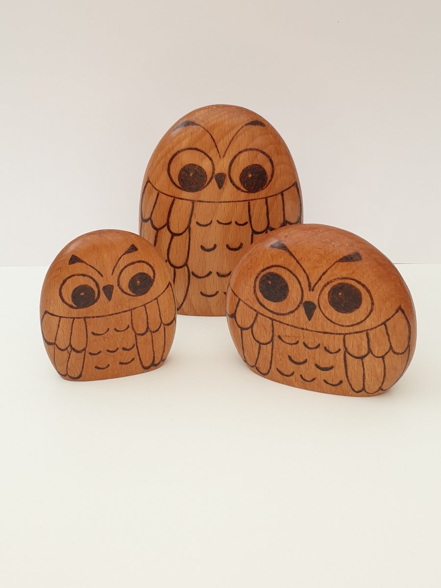 Woodburned owl family trio