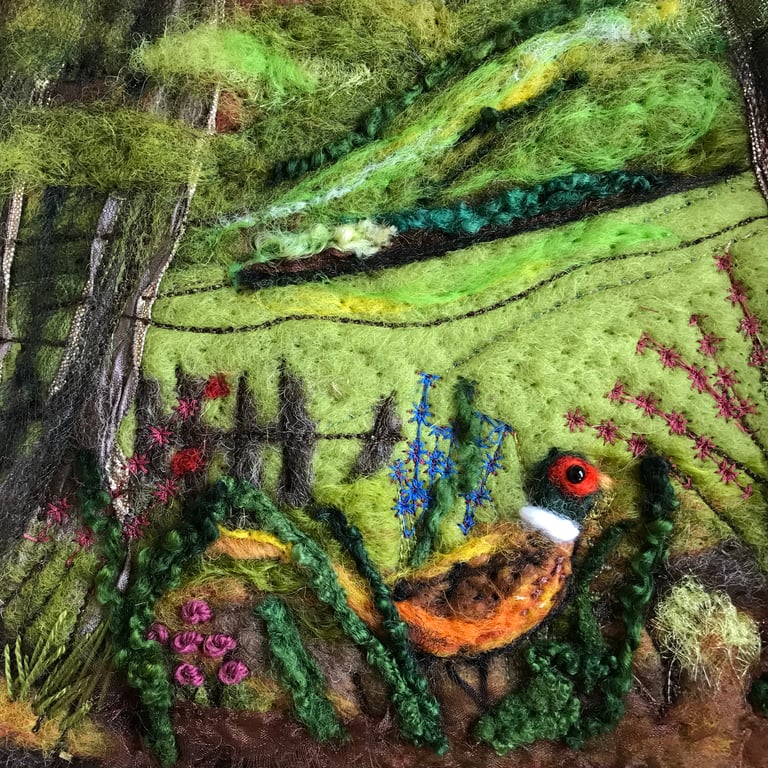 Textile picture pheasant in landscape 