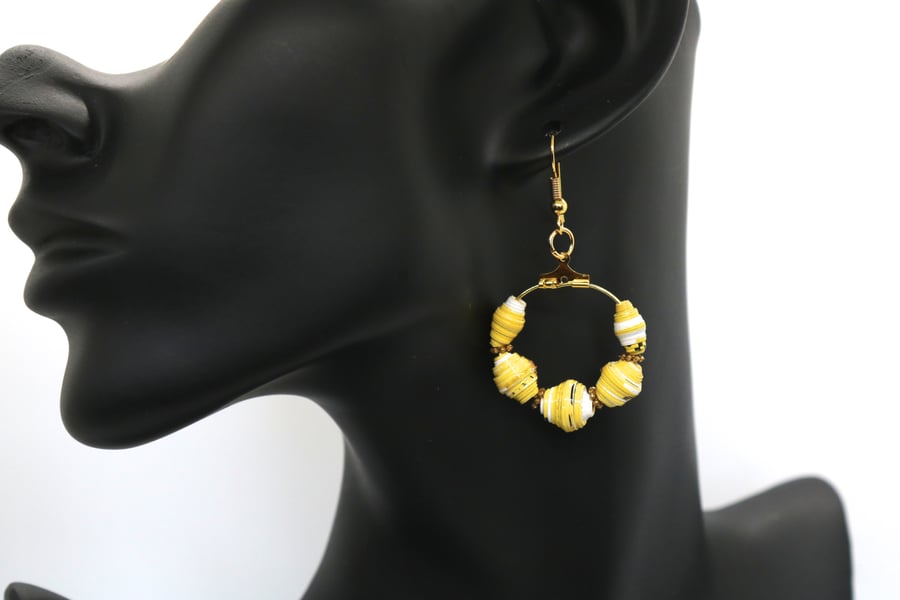 Hoop earrings with small yellow paper beads