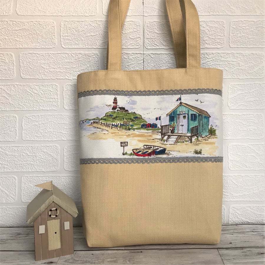 Golden yellow tote bag with beach huts and coast panel