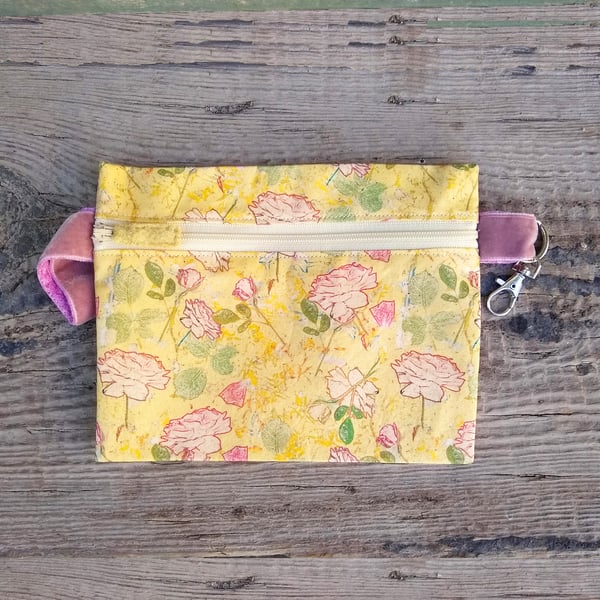 Floral zip pouch with swivel clip