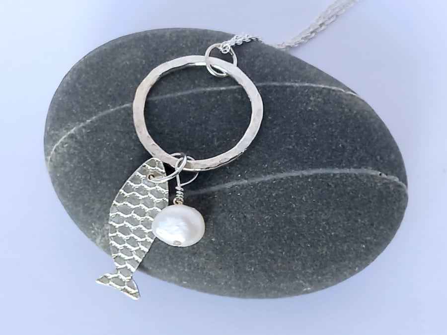 Silver fish pendant with pearl