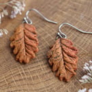 Handmade Ceramic Earrings, Painted Autumn Oak Leaves, Orange and Brown Dangle Le