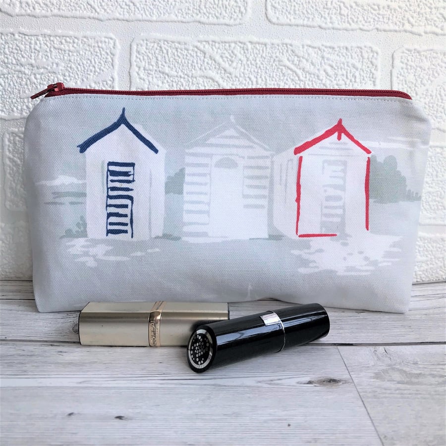 Cosmetic bag, make up bag in grey with blue, red and white beach huts