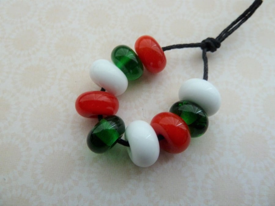 red, green and white lampwork spacer beads
